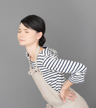 写真：【症状】腰痛・ひざの痛み